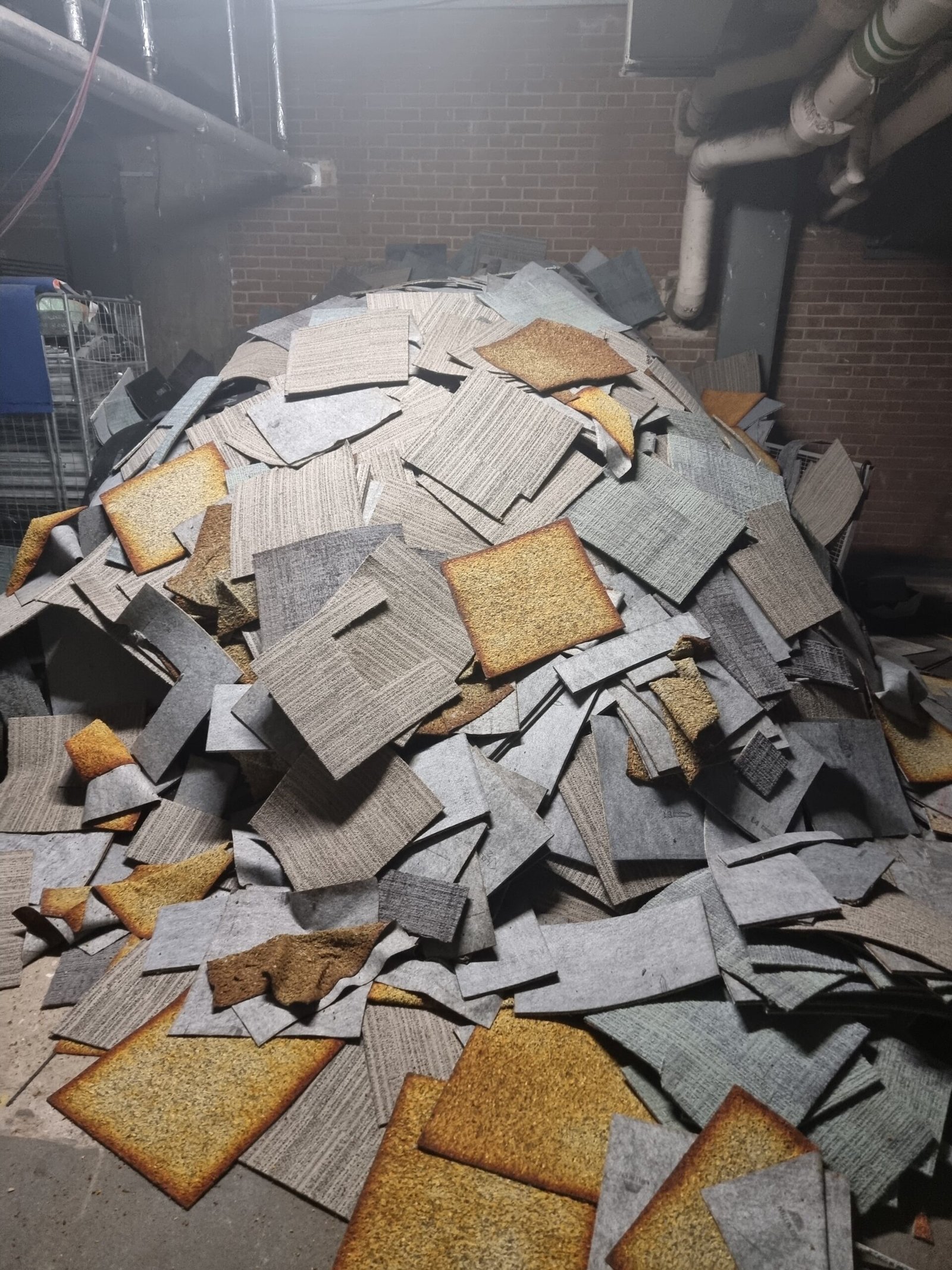 Envirocycle London pile of used carpet tiles