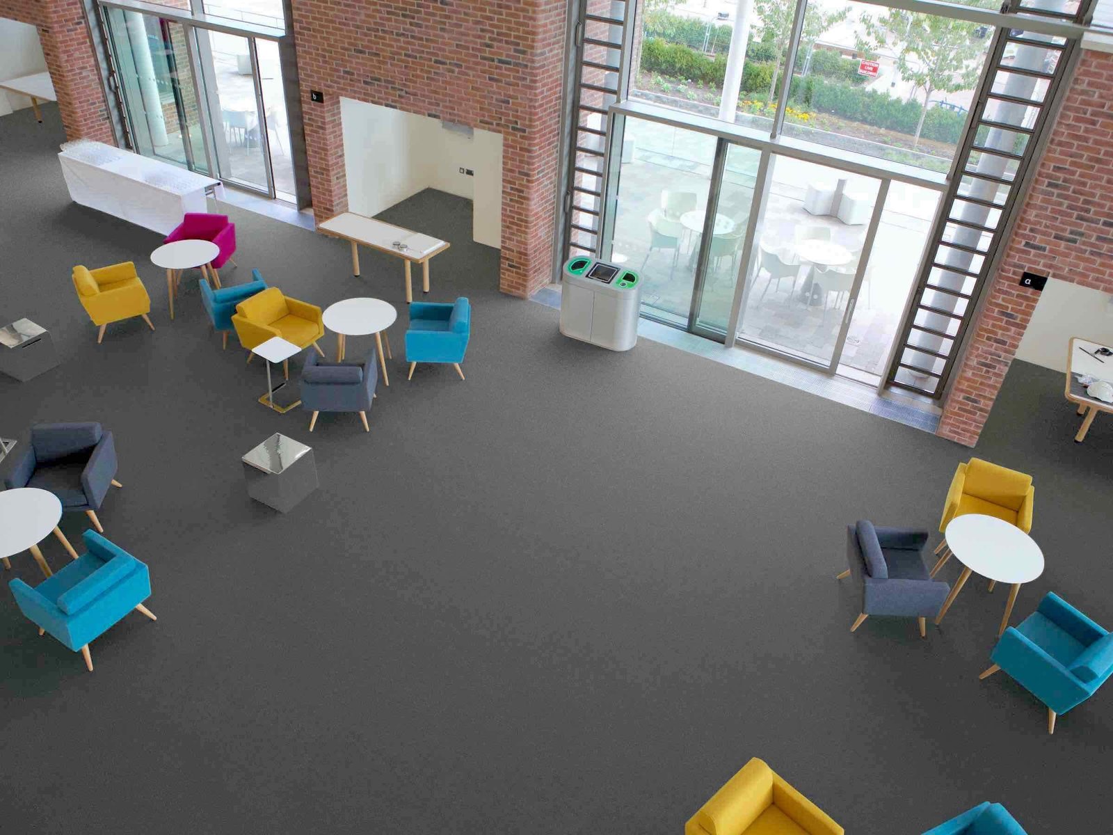 looking down on grey carpet in office space